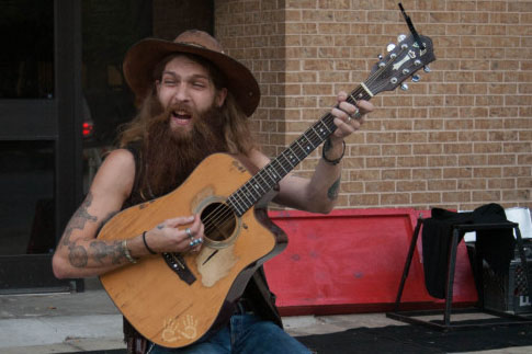 Tyler+Gregory%2C+a+street+musician+at+the+2013+Busker+Festival.