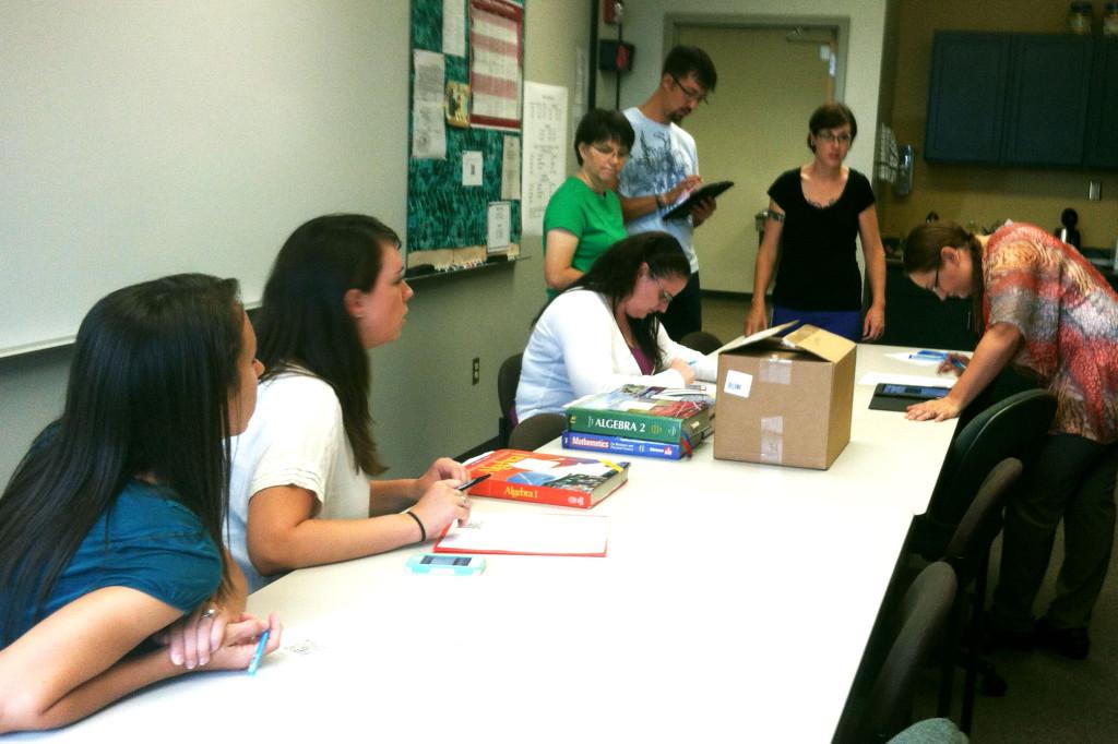 New math teachers learn the ropes from Department Chairs Kathy Wagner and Laura ONeil