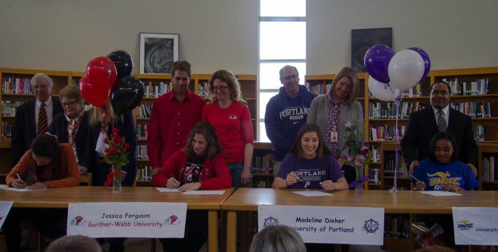 Alexa Harmon-Thomas, Jessica Ferguson, Maddie Dieker and Olivia Hodison sign their letters of intent.