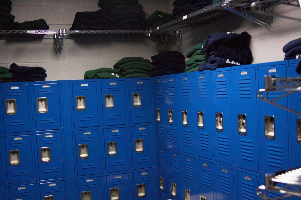 This locker room is where the school attendees grab their required uniforms and place their street clothes in secured lockers.