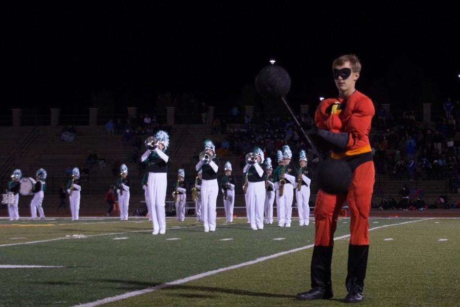 The marching band performs new half time show based on Disneys Pixar movie, The Incredibles. Marching band member Steele Jacobs played the new and improved Mr. Incredible and said while he missed marching, when Mr. Fillmore asked me if I would be a character, I gladly obliged.