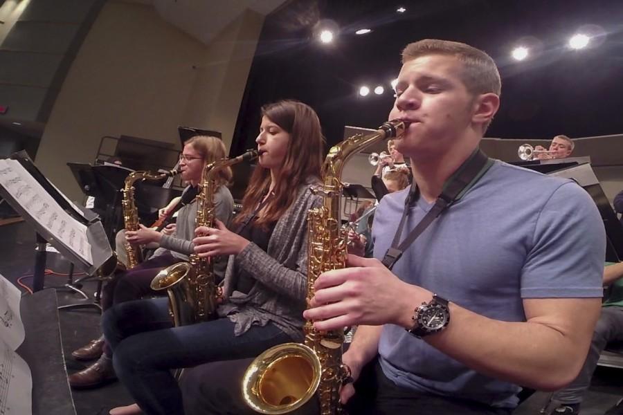 (From right) Senior AJ Zarnoweic and juniors Sydney Gard and Christina Craig play their saxophones. This year, Dr. Albert Miller took over as the new jazz band director. 