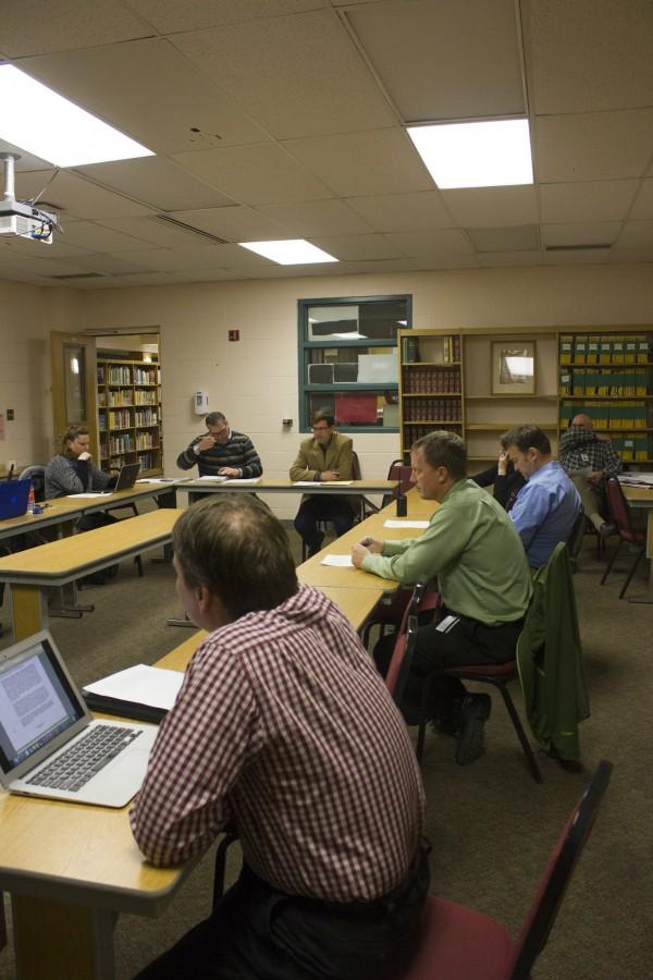 Administrator Steve Heffernan listens to the discussion about the proposal for the new schedule along with other Free State and Lawrence High faculty. Originally just Free State faculty, the committee expanded to include Lawrence High and school board representatives. This year, we were informed that there would be an option for district-wide committee and a lot of [Free State faculty] had already been through this, so we joined, committee member Ben Mellen said.  