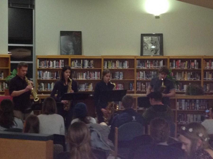 (From left) Senior Aj Zarnoweic and juniors Sydney Gard, Christina Craig and Zach Dixon play a saxophone quartet at the first Coffee House Jams. Student Council set up Coffee House Jams as a way for students to show off their creativity.