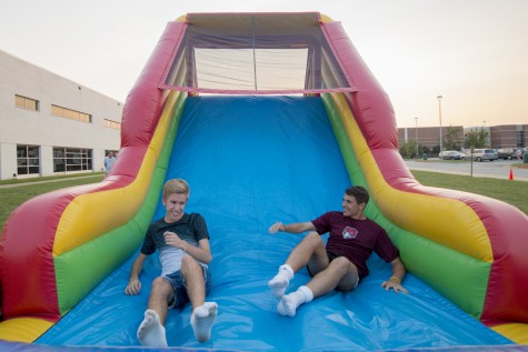 Swedish exchange students,Kevin Munge (right) and Simon Larspers (left), finish the obstacle course at Free State's club fair.