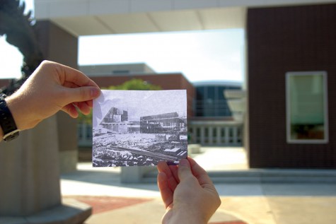 A picture of Free State newly built in 1997 is held in front of the newly renovated Free State building.