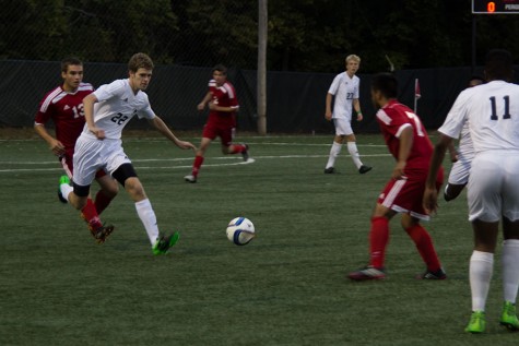 Senior Aric Trent wins the ball in a game against Shawnee Heights High School. Some wold love to have a fourth team for people who do not make C team, JV or varsity. "Theres not enough teams for all the participants and not enough coaches," head coach Kelly Barah said. 