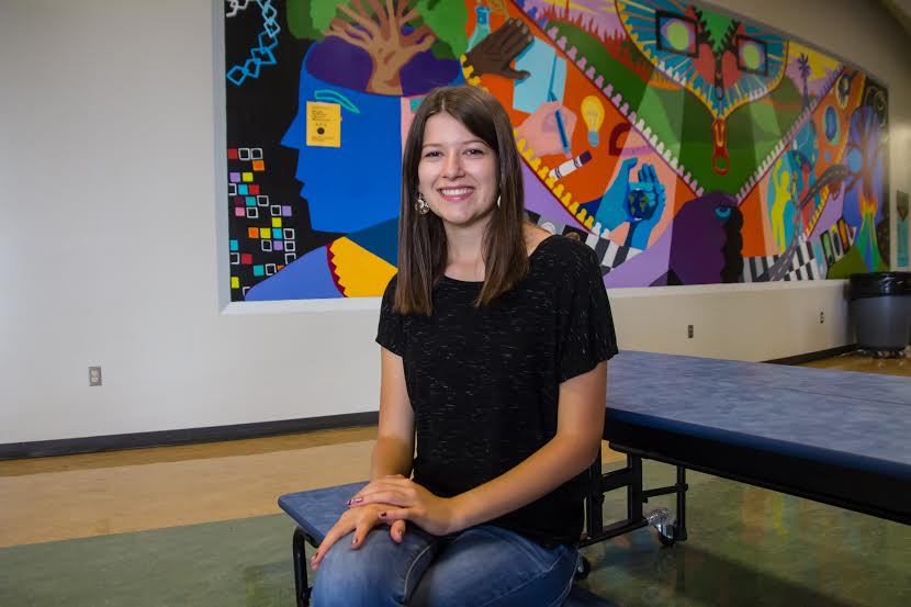 Co-Editor in chief, Sydney Gard, poses of a photo in the commons. Gard is looking forward to her senior year. 