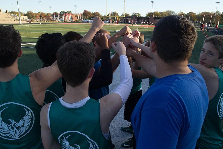 Ultimate Frisbee players come together as a team. The team practices every Monday Wednesday and Friday after school.