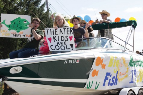 Decorating his boat for homecoming, sophomore Chris Pendry matches the theme for the musical "Big Fish." Weeks of rehearsing and memorization of the songs and lines is what practices consisted of. "People should g to Big Fish because the show has ... all the ranges of emotion," Pendry said. After being a part of four Free State plays before this, Pendry is thrilled that he is now in his first school musical.