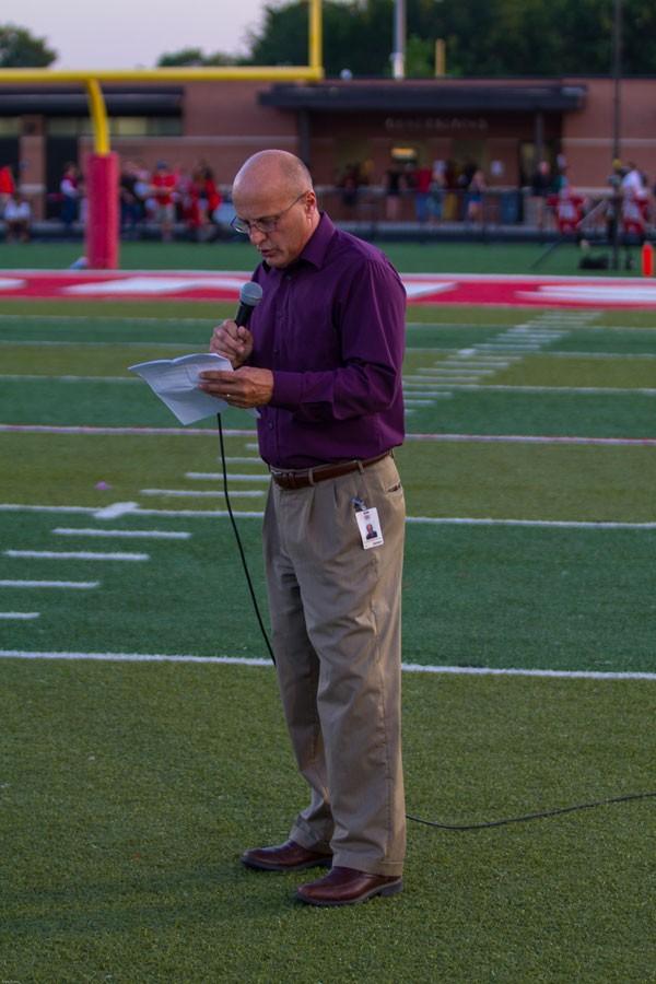 At halftime, Lawrence Superintendent Rick Doll addresses the vandalism that occurred days before the 2014 FS vs LHS football game.