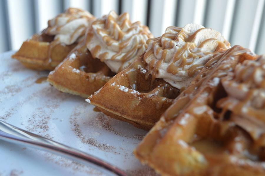 Pumpkin+filling%2C+cinnamon+whipped+cream%2C+caramel%2C+toasted+marshmallow+and+roasted+herbs+are+just+a+few+ingredients+in+the+pumpkin+pie+waffles+at+the+Waffle+Iron.+Owner+Sam+Donnell+says+they+only+use+local+ingredients+in+their+waffles.+For+Donnell%2C+it+is+all+about+getting+a+perfect+combination+of+flavors+for+that+delicious+taste.