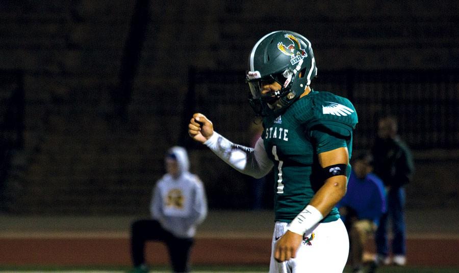 After the Firebirds score a touchdown, senior Bryce Torneden celebrates with a fist pump. 