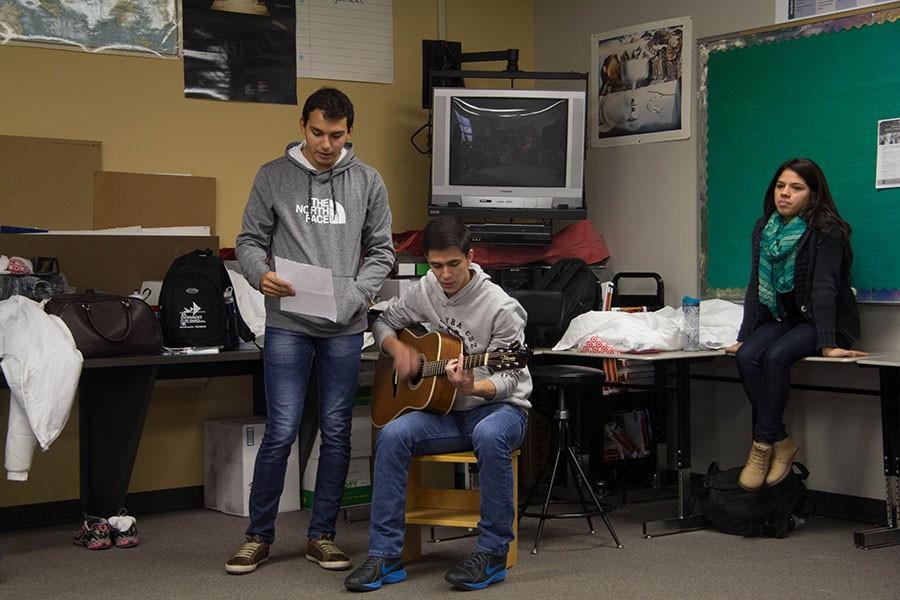 Exchange+students+Juan+Zarate+and+Denis+Sitzmann+play+a+traditional+Paraguayan+song+for+Free+State+spanish+students.+The+group+of+Paraguayans+arrived+on+Jan.+16+and+will+leave+on+Feb.+20.+