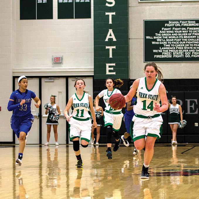 Two girls basketball players reach 1,000 points