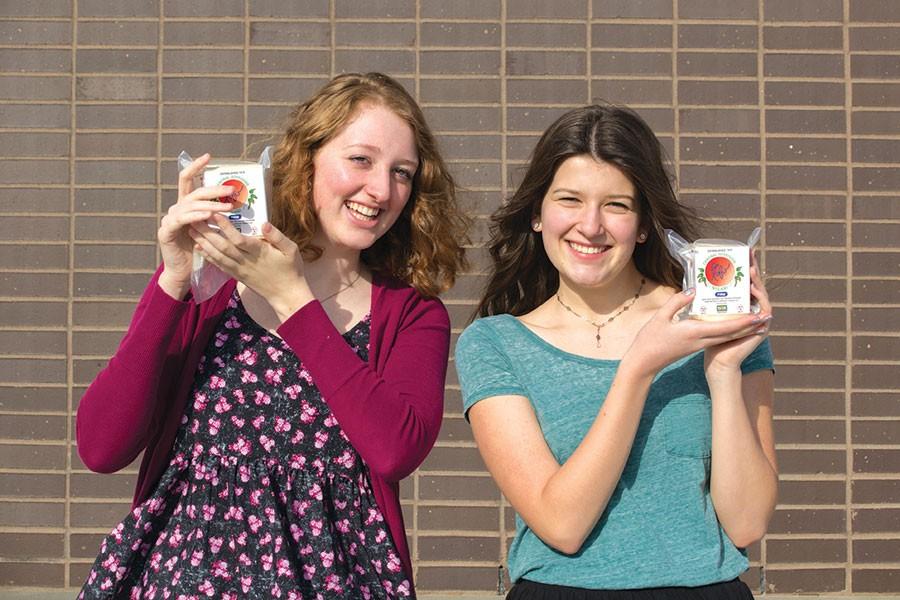 Vegetarians Trenna Soderling and Sydney Gard pose with tofu.