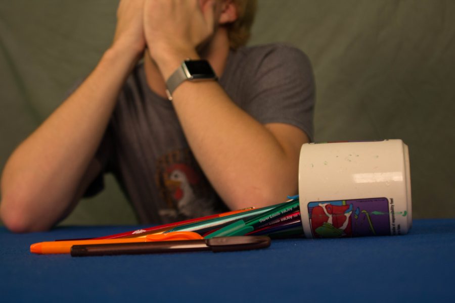 Online Editor-in-Chief Jackson Barton mourns over his spilled mug of pens. The 5.4 magnitude earthquake occurred around 7:30 am on Saturday, September 3rd. 