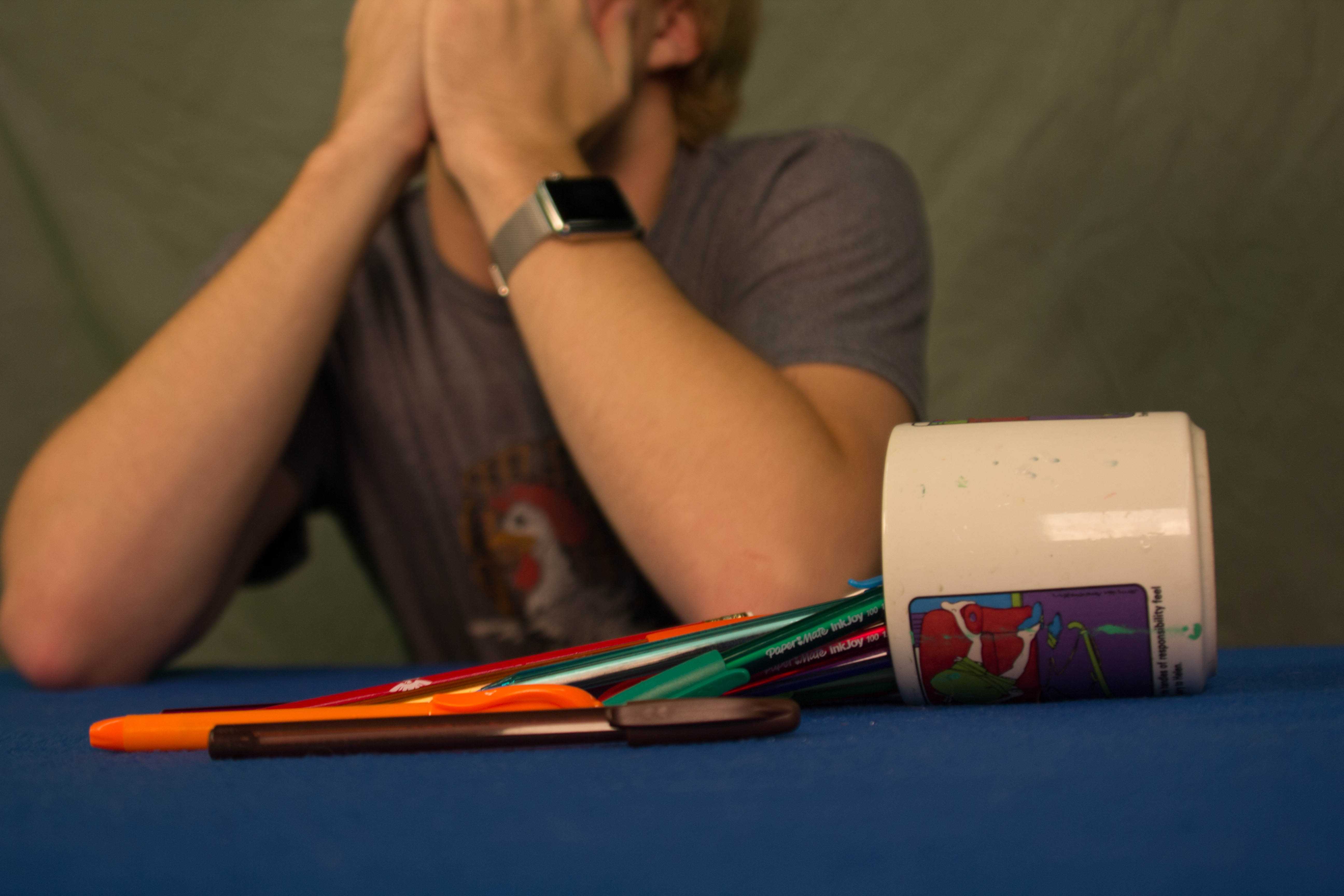 Online Editor-in-Chief Jackson Barton mourns over his spilled mug of pens. The 5.4 magnitude earthquake occurred around 7:30 am on Saturday, September 3rd.