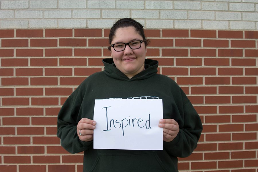 Senior Isabelle Krones displays their word, Inspired