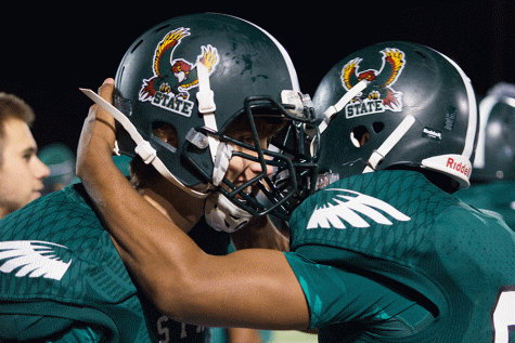 Varsity football stops short of State
