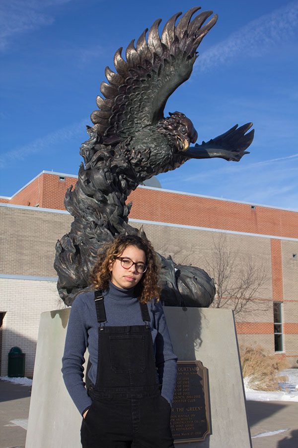 Standing in front of Freddy the Firebird for the last time, Brittany Swearingen says goodbye to Free State at semester, making the decision to complete her high school education through the Lawrence Virtual School.