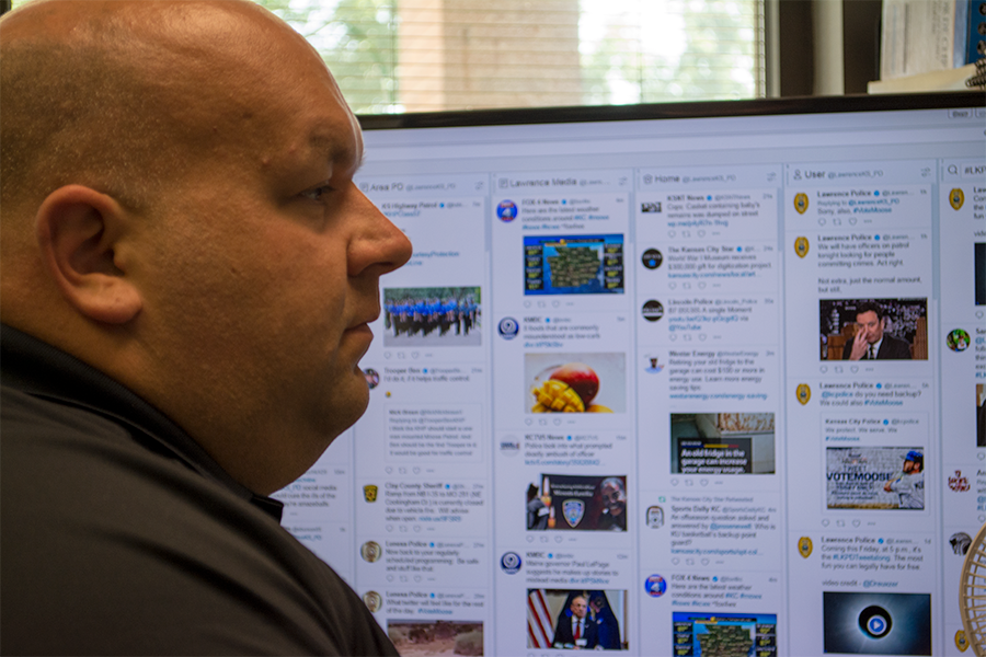 Finnelly keeps an eye on the @LawrenceKS_PD twitter feed while working. The account had over 35,000 followers.