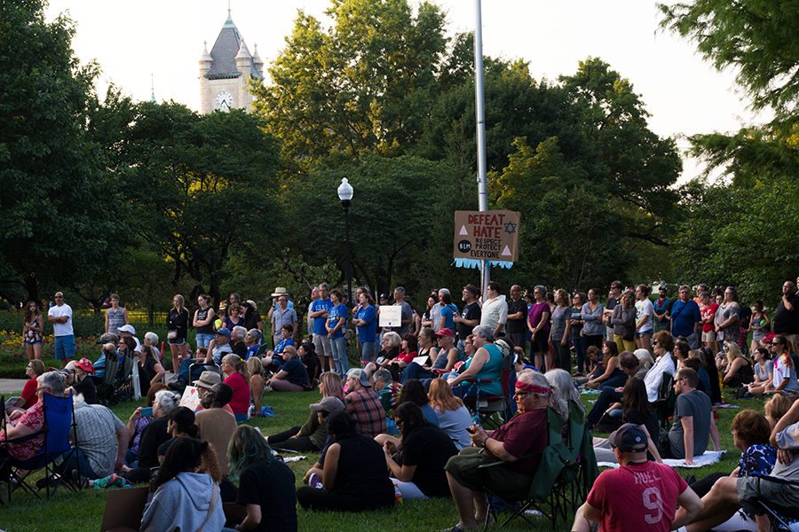 A large crowd gathers in South Park for the Sunday night vigil. The vigil was hosted by The Resistance LFK.