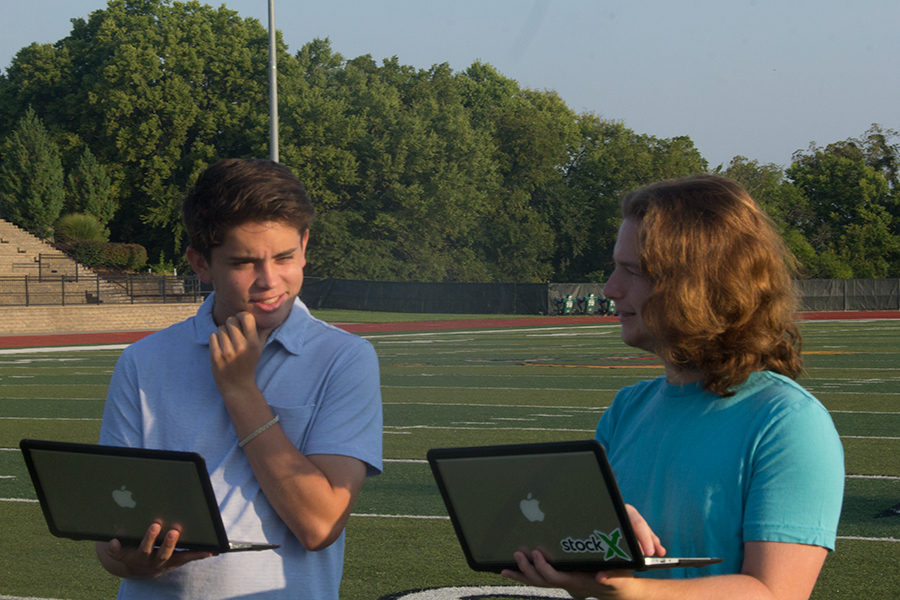 Will Cook and Evan Cornell contemplate their draft picks. The NFL season begins Thursday, Sept. 7.