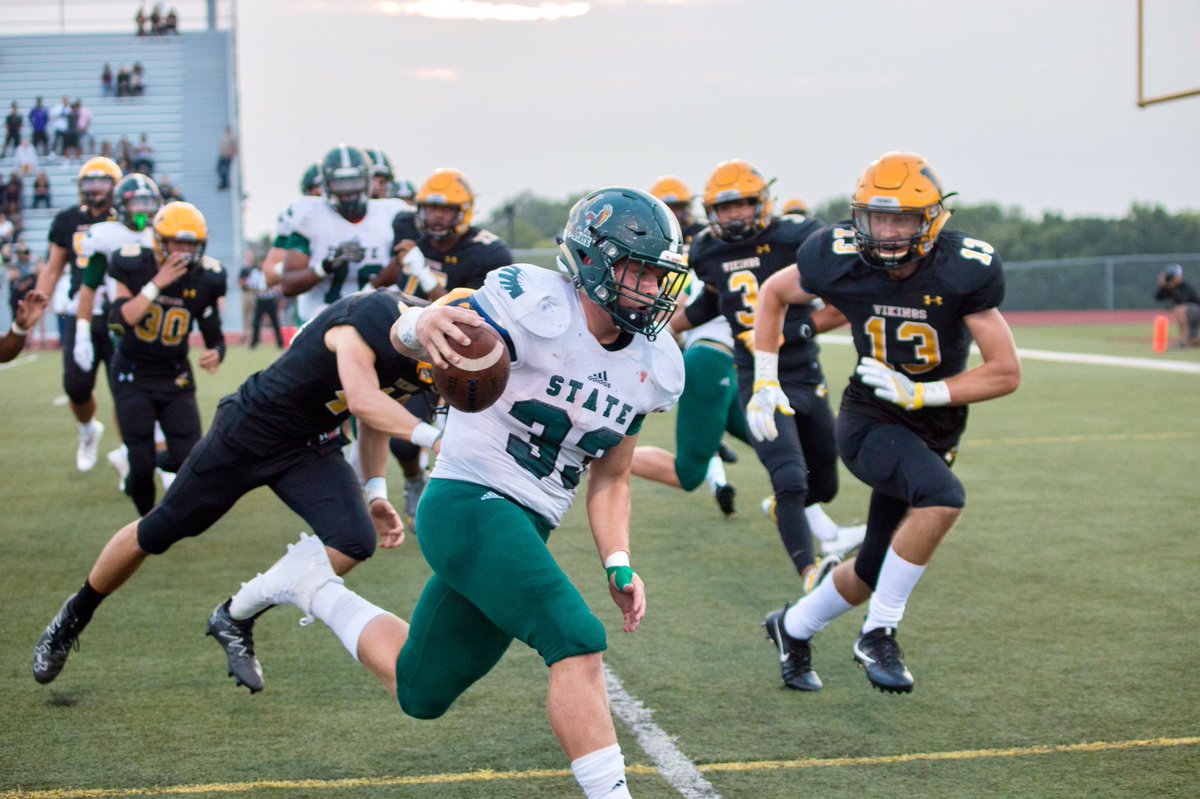Just before scoring a 27 yard touchdown, junior Jax Dineen avoids getting tackled. The firebirds won against SMW with a score of 56-9. Its the first time weve beat that team in awhile Dineen says. 