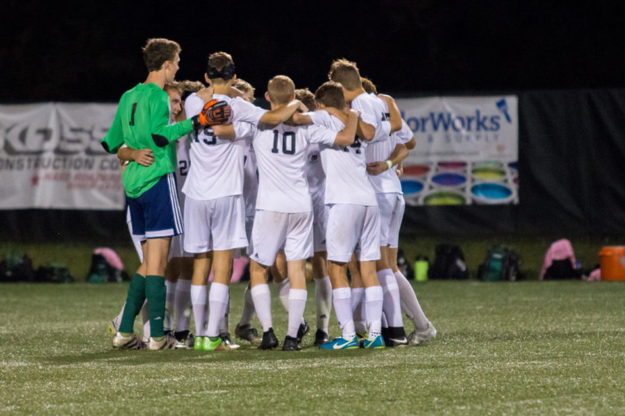 Before the second half started, the soccer team huddled together. The firebirds ended the first half with the opposing team scoreless. 