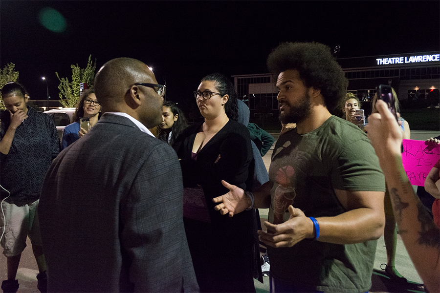 Prominent Black Lives Matter Lawrence member Caleb Stephens argues with area director Anthony Robinson.