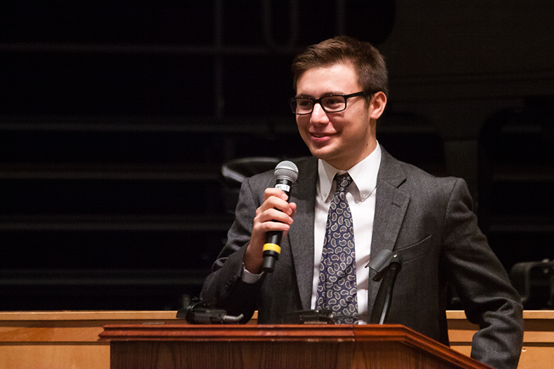 Standing at the podium, Dominique Scavuzzo talks about his views. He is a moderate conservative running as a rebublican.“We need cooperation and not moving left or right, but moving forward.” Scavuzzo said.