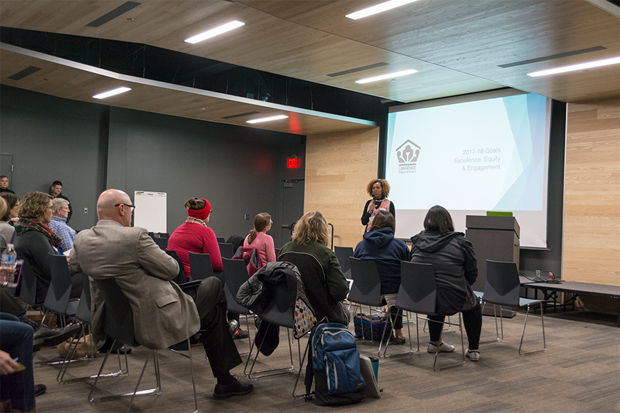 Interim superintendent Dr. Anna Stubblefield opens the evening conversation with district accomplishments since the previous conversation last January. Attendees were handed sticky notes to write an issue they wanted discussed on.