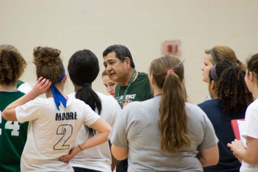 At girls basketball tryouts on November 14 the head coach, Ted Juneau talks to the girls. This year the varsity team only has one senior player. The fact that theyre young has nothing to do with a lack of experience so thats the good thing, Juneau said.