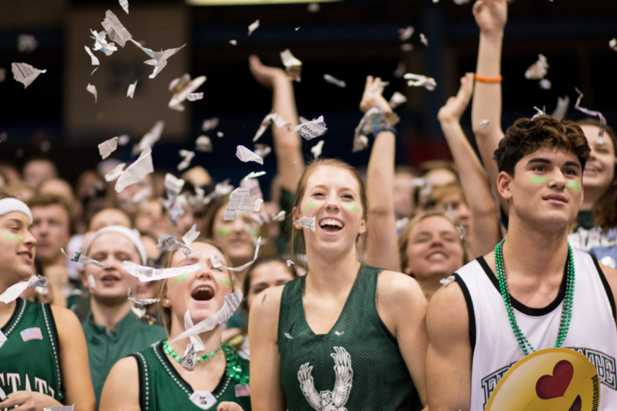 After tip off, the firebird student section throws teared up news papers into the air. 