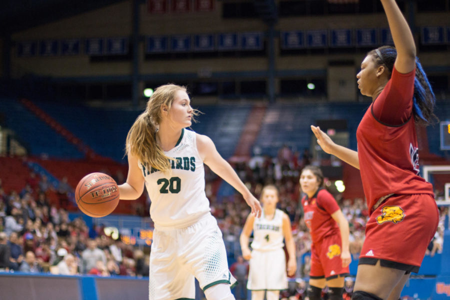 Sophomore Haley Hippe looks for a teammate open to pass the ball.