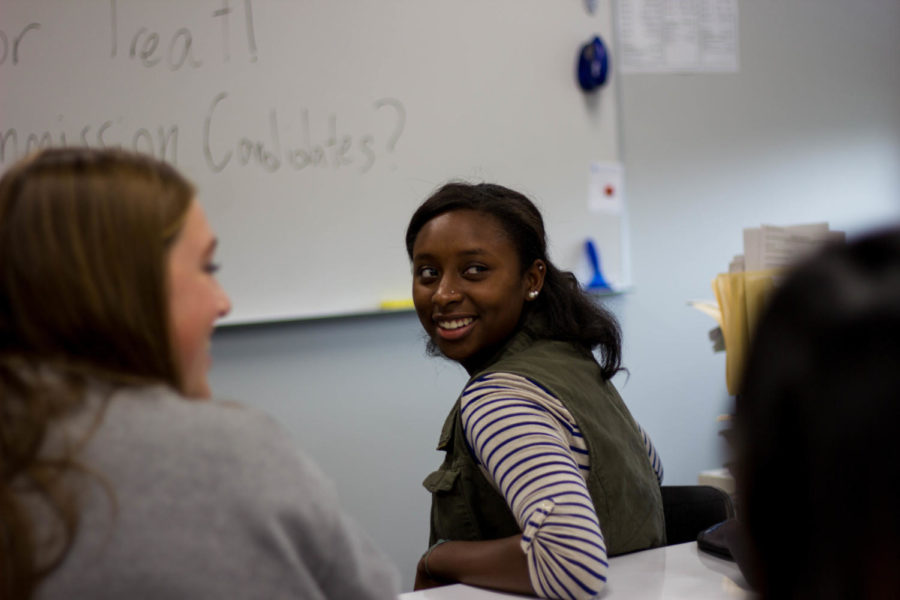  Senior Laila Robinson smiles as another club member shares an idea. Many of the Young Dems meetings are discussion-oriented, giving students a chance to share their ideas and opinions. 