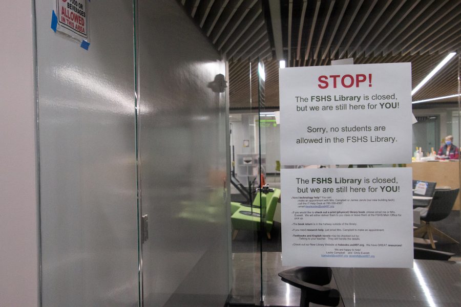 A sign posted by the Free State Library staff informs students that even though the library isn’t in use they are still here to help. With students coming back into the classroom, teachers are doing everything in their power to keep everyone safe.  New guidelines are being put into place to maximize social distancing and minimize contact. These rules include restrictions regarding leaving the classroom during class, and new restrictions on several common areas like the Free State Library.
