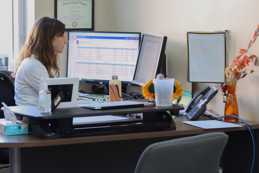 In her office, school counselor and mental health worker Katie Brandau is looking at a students’ schedule for the second semester.
