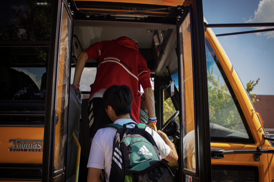 Senior Captain, Ming Da Zhang, steps onto the bus for the team’s trip to Gardner-Edgerton. Although the Varsity Boys Soccer team did not play until 7pm, they had to conform to the difficult agenda of bus routes, leaving at 1pm. With over five hours of downtime before playing, student-athletes have to find productive ways to spend their time.