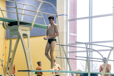 Archived photo from 2022 spring dive season. Focusing before his dive, junior Elliot Ahlvers gets ready. Ahlvers placed second at State in 2022.