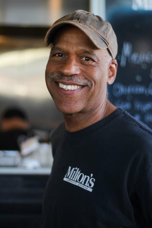Miltons Cafe owner David Lewis smiles at the camera.
