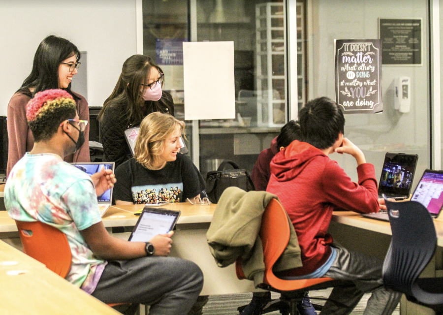 Members of the Robotics Team come together from Free State and Lawrence High to collaborate at the College and Career Center on how they can improve their coding skills.