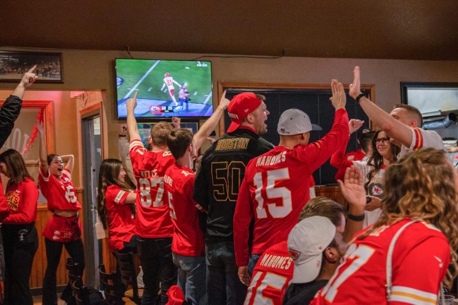 Fans celebrate the final score at Johnnys North. 