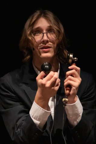 After discovering a murder on the Orient Express, Monsieur Bouc, played by sophomore Cooper-Atlas Hefty, calls for help. Although being involved since fifth grade, their theater experience was brought to a halt during the pandemic. “I missed the feeling of theater and how fun it was,” Hefty said.