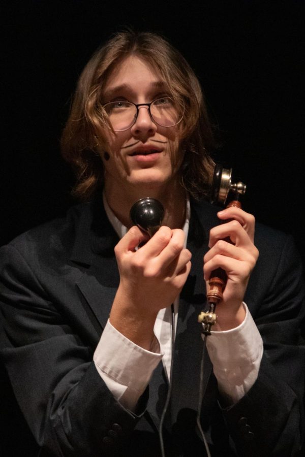 After+discovering+a+murder+on+the+Orient+Express%2C+Monsieur+Bouc%2C+played+by+sophomore+Cooper-Atlas+Hefty%2C+calls+for+help.+Although+being+involved+since+fifth+grade%2C+their+theater+experience+was+brought+to+a+halt+during+the+pandemic.+%E2%80%9CI+missed+the+feeling+of+theater+and+how+fun+it+was%2C%E2%80%9D+Hefty+said.