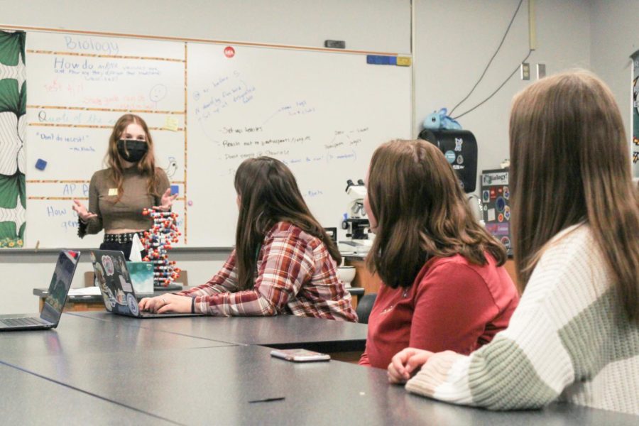 Junior Yael Gillath speaks about her project to fell students at the Women in STEM Showcase hosted at Free State on April 5, 2023.