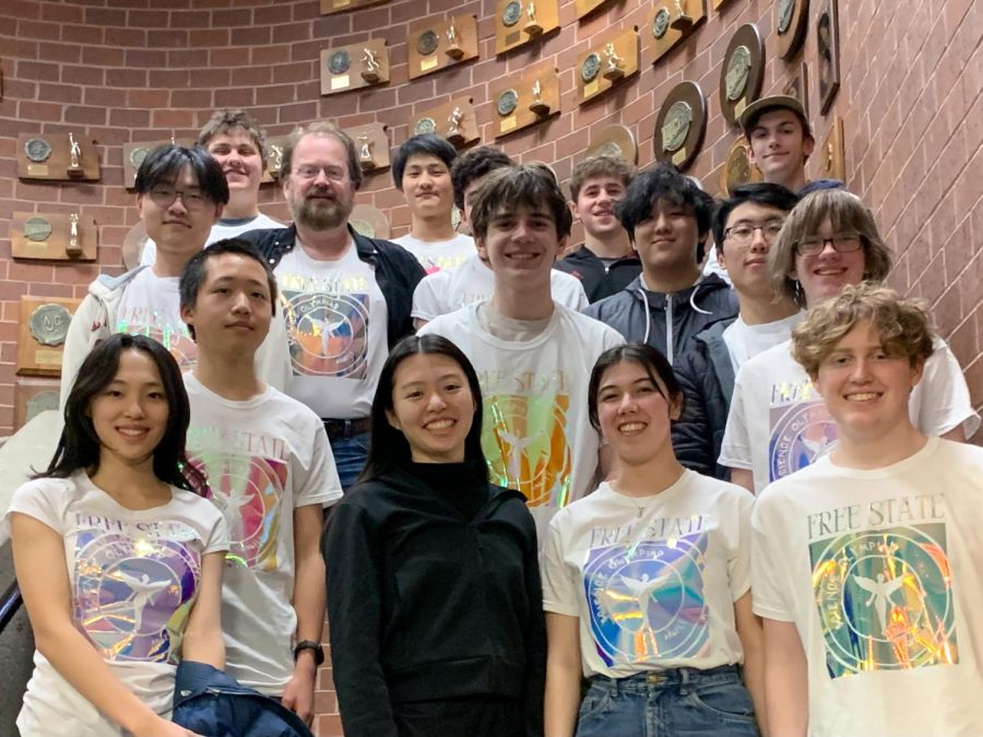 Ahead of winning 3 medals at the state competition, the Science Olympiad team poses for a picture in their team shirts at Wichita State University on April 1. Members worked closely for months to prepare for the event. When describing the team environment, junior John Platkowski said, “It’s casual, friendly, and everyone enjoys working with their partners.” Contributed by Mike Colvin.
