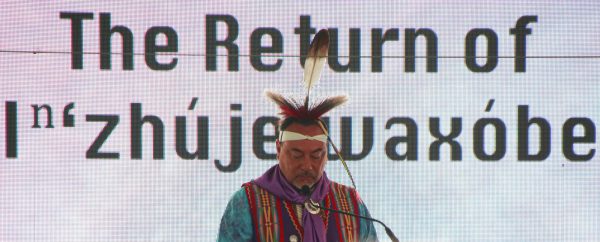 Prior to the relocation of the Sacred Red Rock, or Inzhjewaxóbe, to Allegawaho Memorial Heritage Park, James Pepper Henry, a vice chairman of the Kaw nation, speaks at Buford M. Watson Jr. Park. The Return of Inzhjewaxóbe was celebrated on Aug. 29 to honor the rock, which was brought there in 1929 from the junction of the Shunganunga Creek and Kansas River to become a monument to the citys early founders.