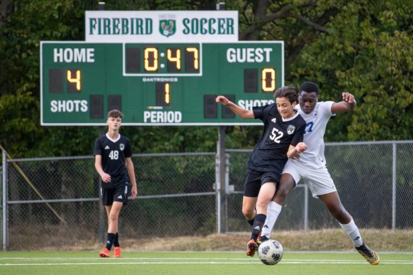 During the final seconds of the first half, freshman Ryan Mastrosimone battles the defender for the ball. The Firebirds beat Gardener Edgerton 4-0 on Oct 4.